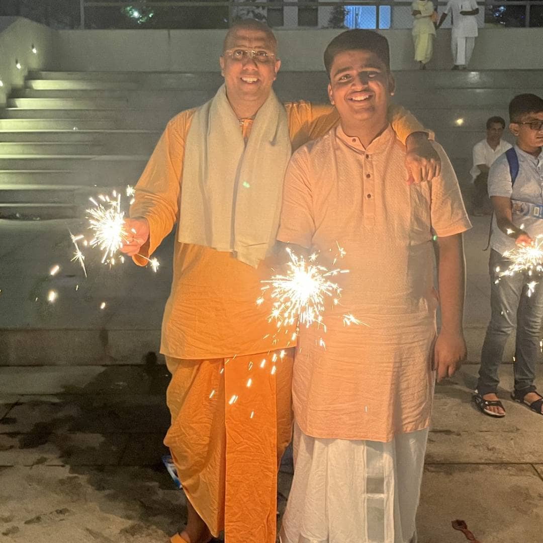 Joyful kirtan celebration with devotees