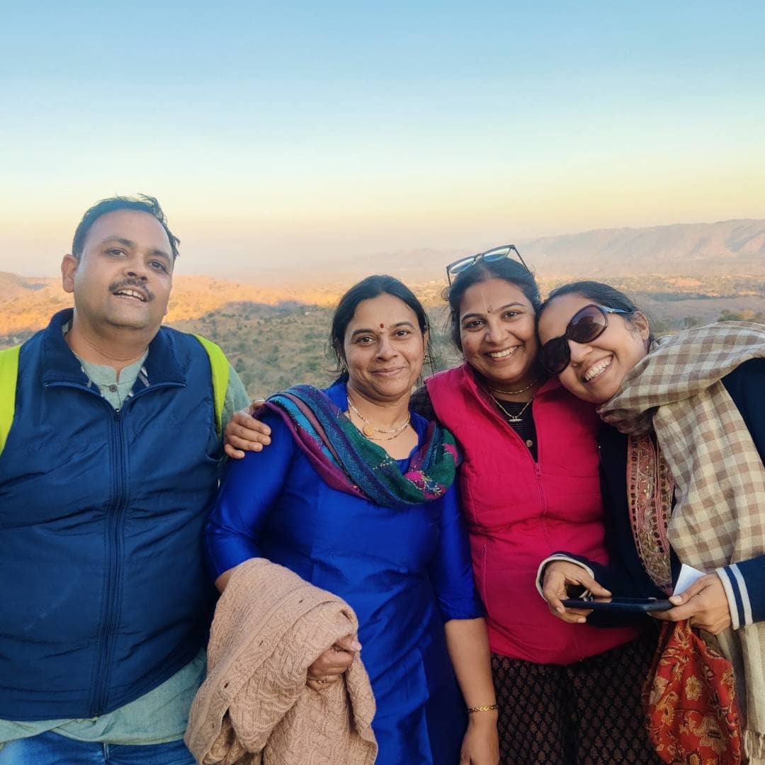 Devotees on a yatra in a serene natural setting